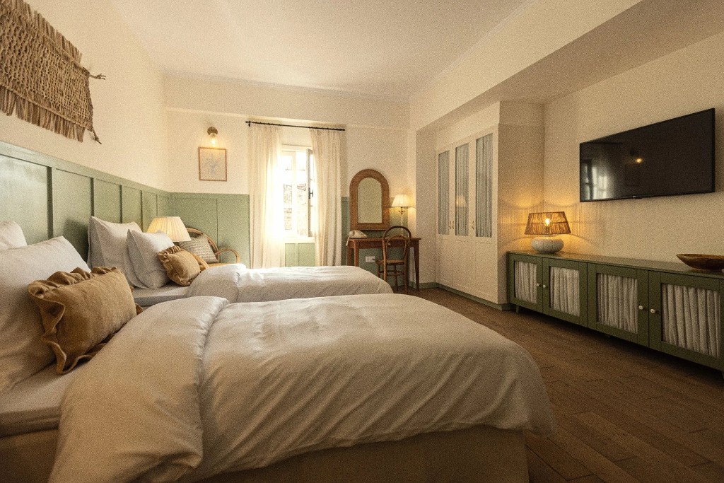 Demi Room · twin layout with the green sideboard