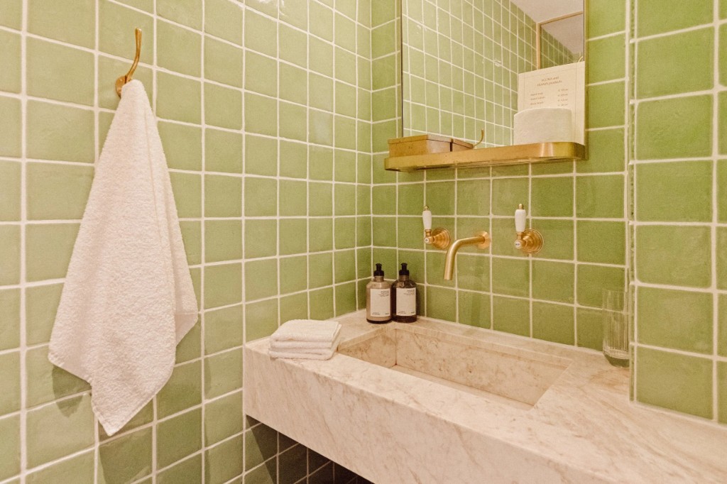 Petite Room · the green-tiled marble bathroom